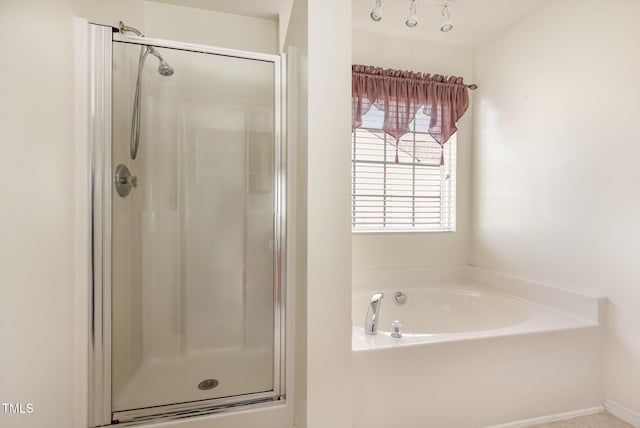 1009 Limeberry Ct, Clayton, NC 27520 - full bath with a bath and a stall shower