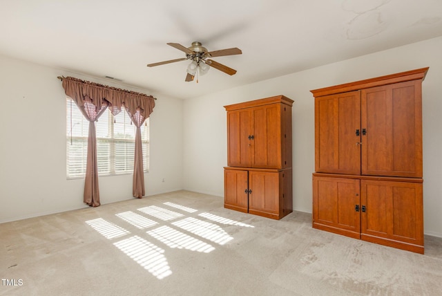 1009 Limeberry Ct, Clayton, NC 27520 - unfurnished bedroom featuring light carpet, a ceiling fan, and baseboards