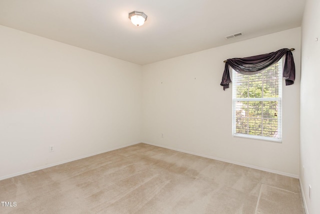 1009 Limeberry Ct, Clayton, NC 27520 - spare room featuring light colored carpet, baseboards, and visible vents