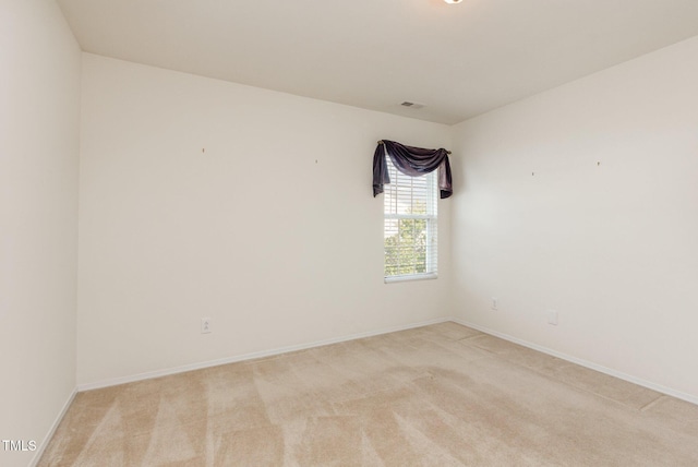 1009 Limeberry Ct, Clayton, NC 27520 - unfurnished room with light carpet, visible vents, and baseboards