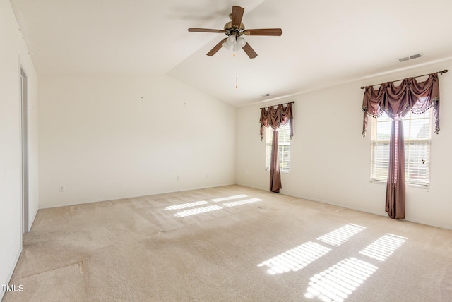 1009 Limeberry Ct, Clayton, NC 27520 - empty room featuring light colored carpet, lofted ceiling, a ceiling fan, and visible vents