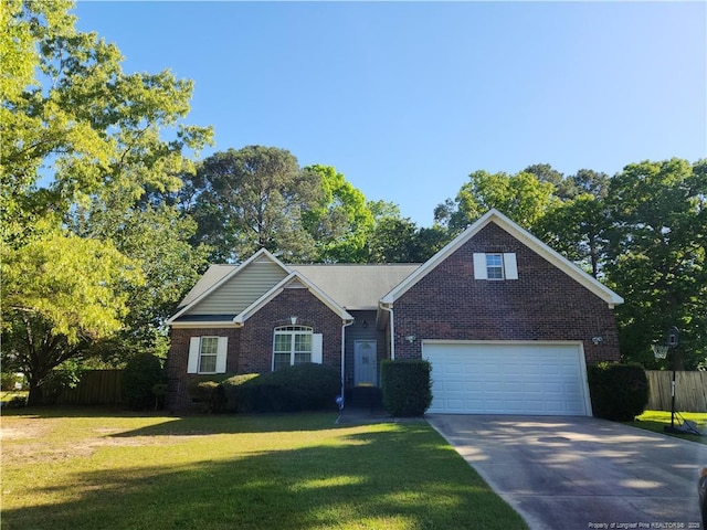 view of front facade featuring brick siding, concrete driveway, a front yard, and fence