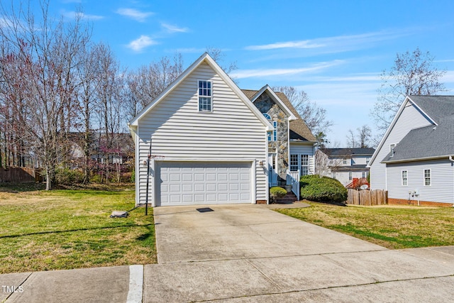 view of side of home featuring a yard, fence, a garage, and driveway