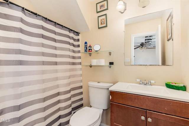 full bathroom featuring vanity and toilet