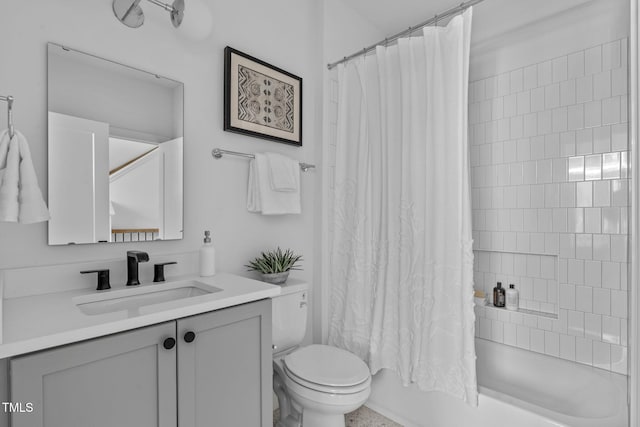 full bath featuring vanity, toilet, and shower / tub combo with curtain