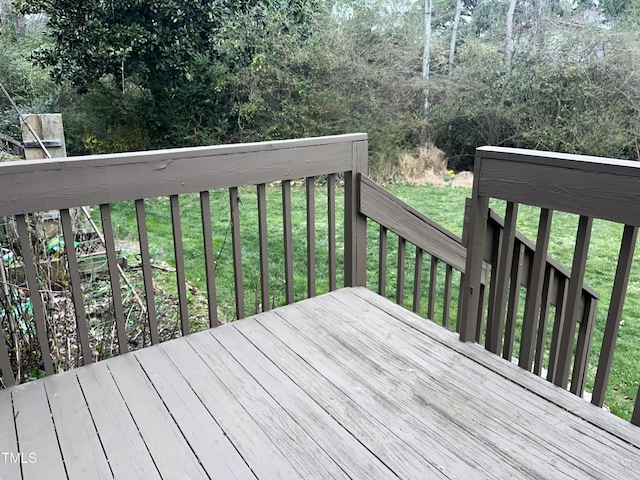 deck featuring a yard