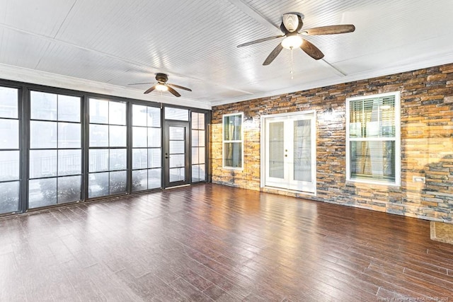 interior space featuring wood finished floors and ceiling fan