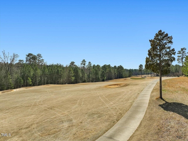 exterior space featuring a view of trees