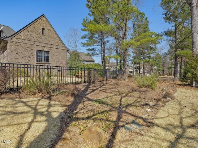 view of yard with fence