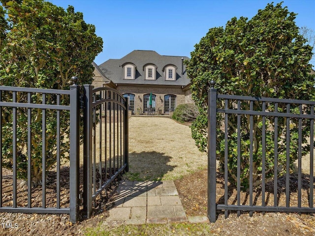 view of gate featuring fence