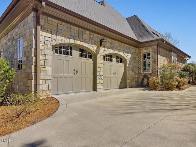 garage with driveway