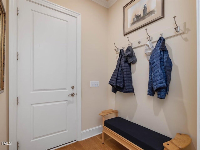 mudroom with baseboards and wood finished floors