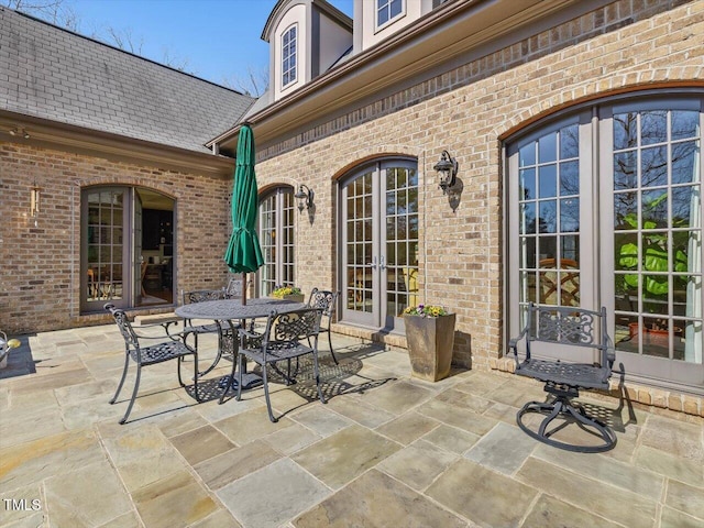 view of patio with french doors and outdoor dining area