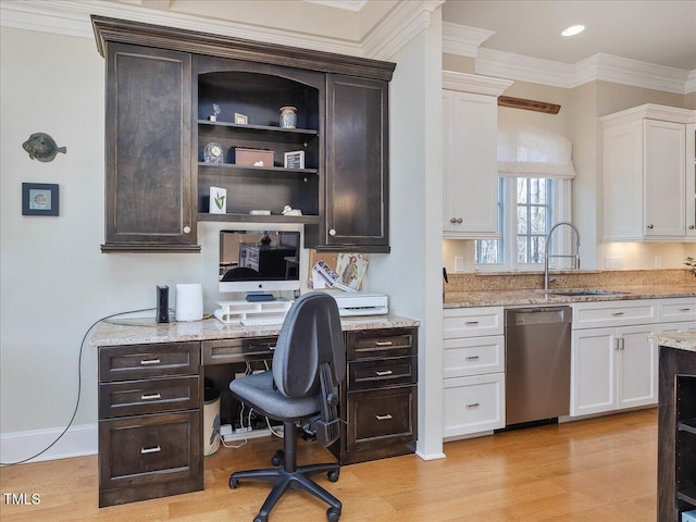 office with crown molding, baseboards, recessed lighting, light wood-style floors, and a sink