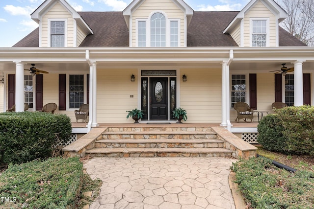 view of front of house featuring a porch, a shingled roof, and ceiling fan