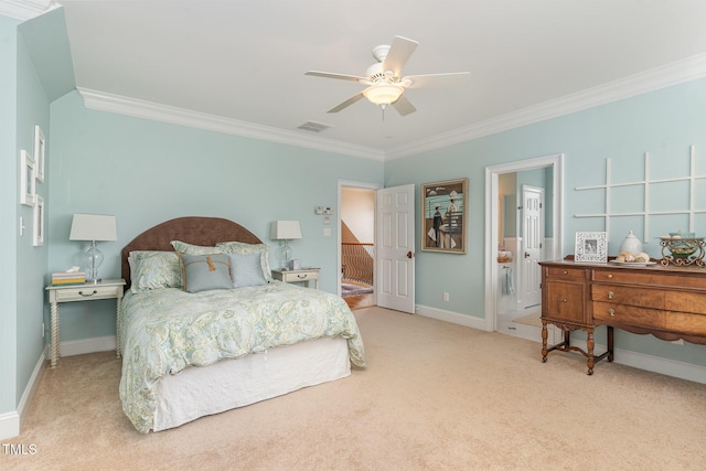 carpeted bedroom with visible vents, ornamental molding, a ceiling fan, connected bathroom, and baseboards