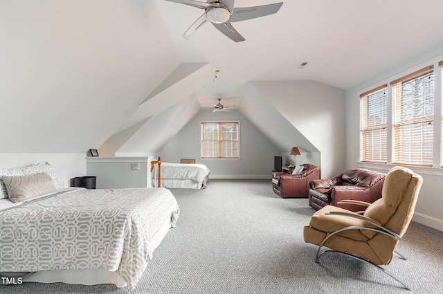 bedroom featuring ceiling fan, baseboards, carpet, and lofted ceiling