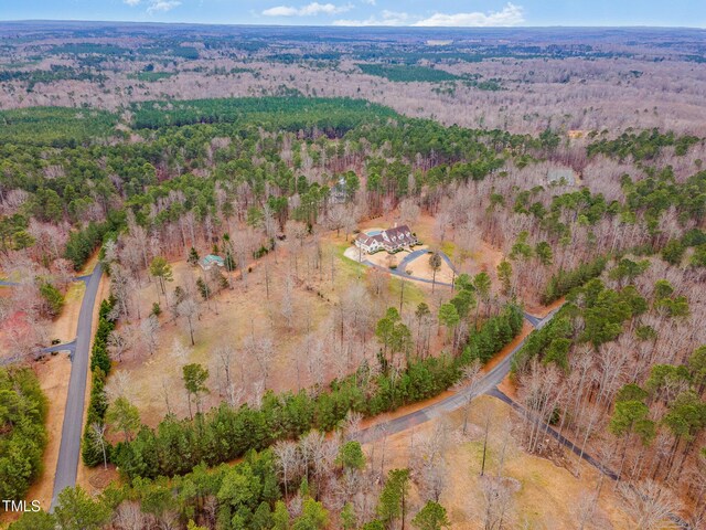 bird's eye view with a forest view