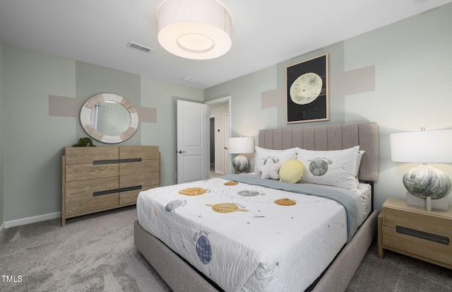 bedroom with visible vents, baseboards, and carpet floors