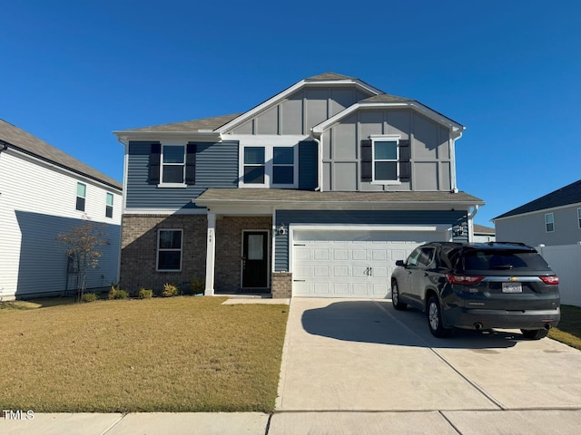 view of front of house with brick siding, board and batten siding, concrete driveway, a front yard, and an attached garage