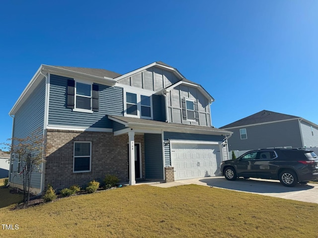 view of front of home with brick siding, driveway, an attached garage, and a front yard