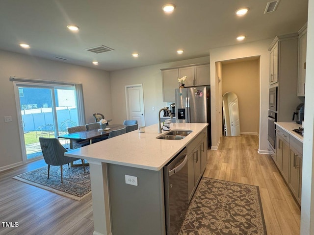 kitchen featuring visible vents, recessed lighting, stainless steel appliances, and light wood-style floors