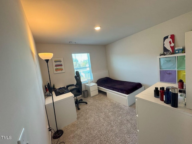 carpeted bedroom with visible vents