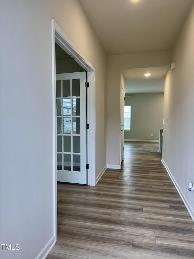 768 Riguard Way, Wendell, NC 27591 - corridor featuring wood finished floors, baseboards, and recessed lighting