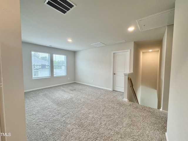 768 Riguard Way, Wendell, NC 27591 - carpeted spare room featuring attic access, baseboards, and recessed lighting