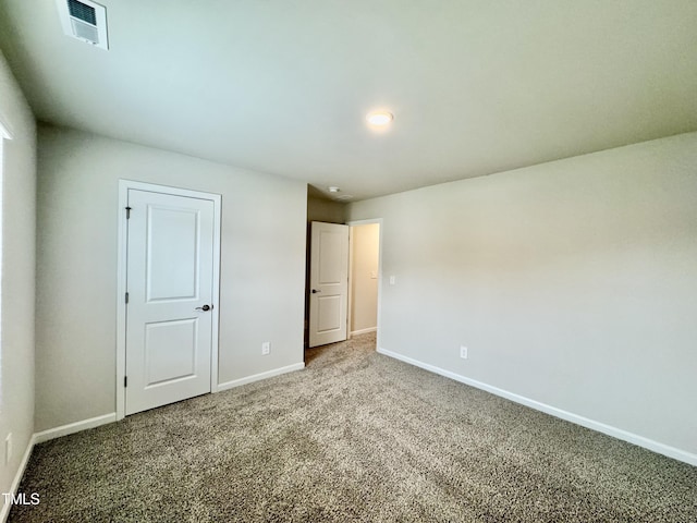 768 Riguard Way, Wendell, NC 27591 - unfurnished bedroom featuring baseboards and carpet floors