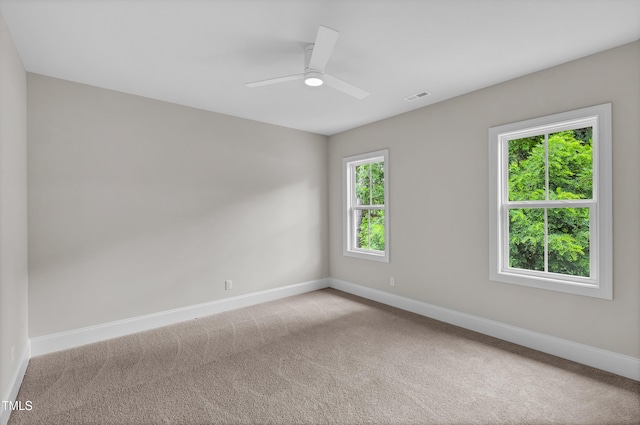 12912 Grey Willow Dr, Raleigh, NC 27613 - unfurnished room featuring baseboards and light carpet