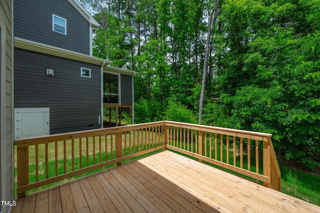12912 Grey Willow Dr, Raleigh, NC 27613 - wooden deck with a sunroom