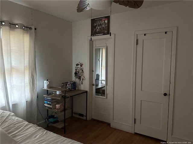 bedroom featuring wood finished floors