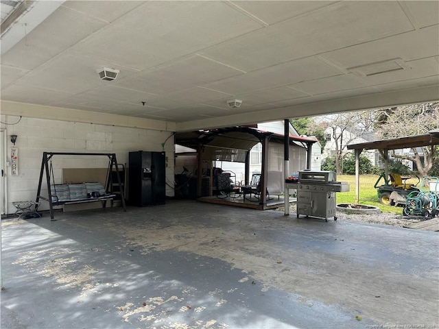 view of patio featuring a carport