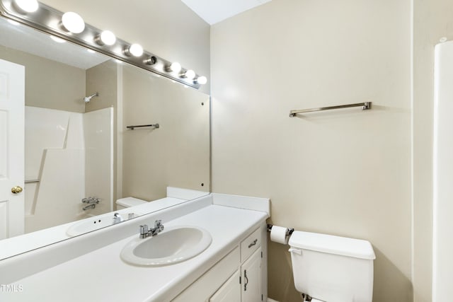 full bath with shower / bath combination, toilet, and vanity