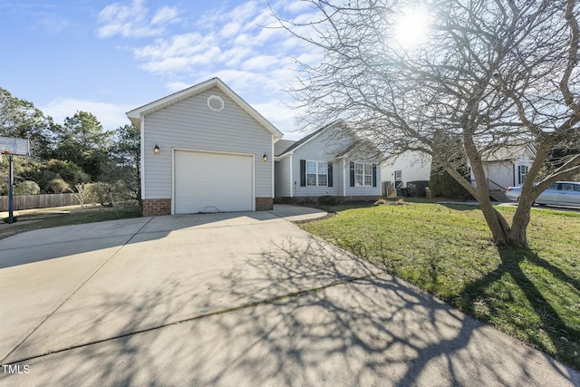 single story home featuring an attached garage, concrete driveway, a front yard, and fence