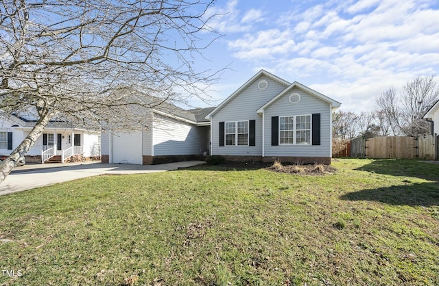 view of front of house featuring a garage, a front lawn, driveway, and fence