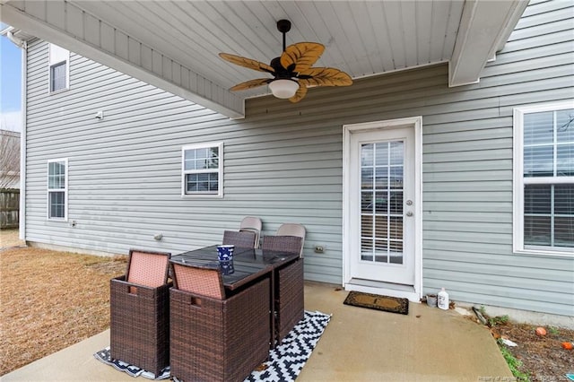 view of patio featuring ceiling fan