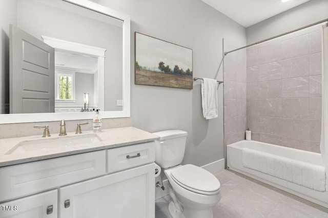 bathroom with shower / bath combination, baseboards, toilet, and vanity