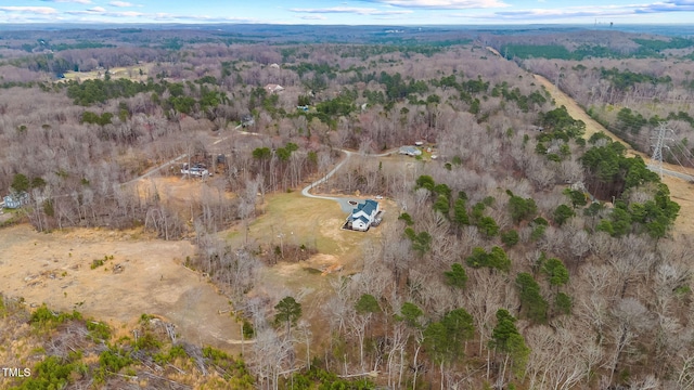 aerial view with a wooded view