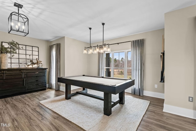 rec room with a chandelier, baseboards, wood finished floors, and billiards