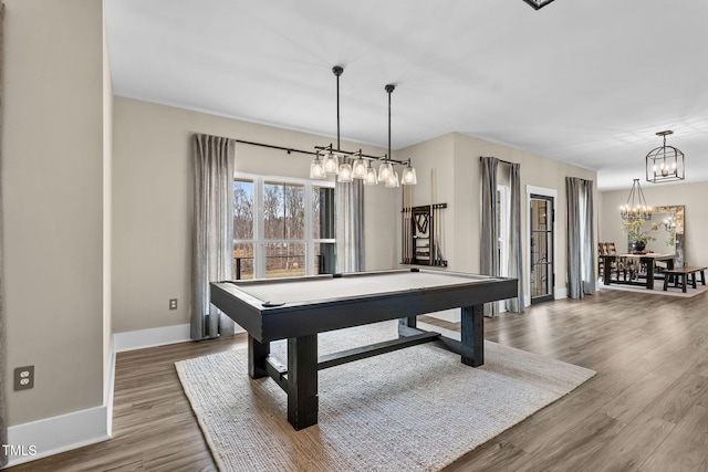 game room with baseboards, billiards, an inviting chandelier, and wood finished floors