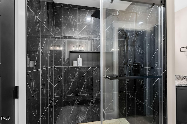 full bath featuring a marble finish shower