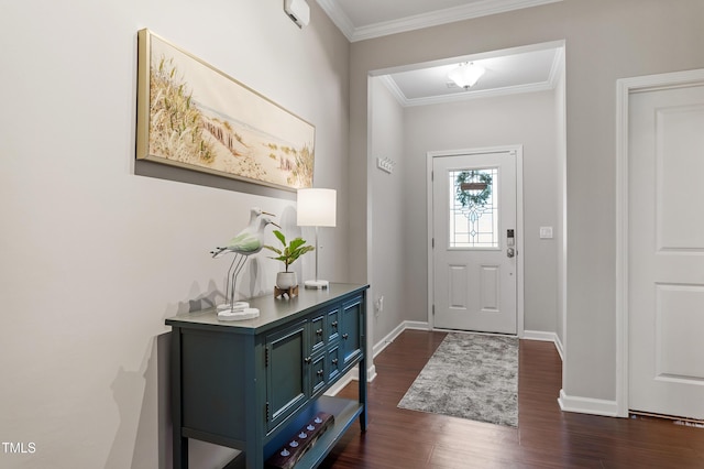 entryway featuring dark wood-type flooring, crown molding, and baseboards