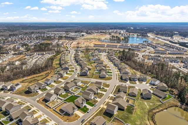 aerial view featuring a residential view and a water view