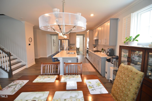 dining area featuring dark wood-style floors, recessed lighting, stairway, crown molding, and baseboards