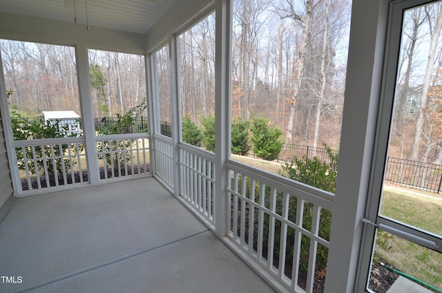 unfurnished sunroom with a healthy amount of sunlight