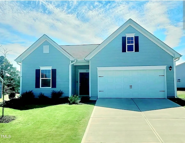 ranch-style house with a garage, driveway, and a front lawn