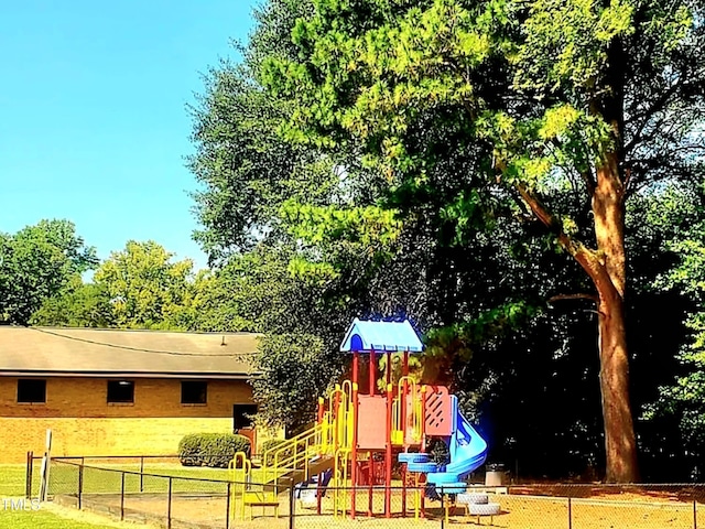 community playground featuring fence