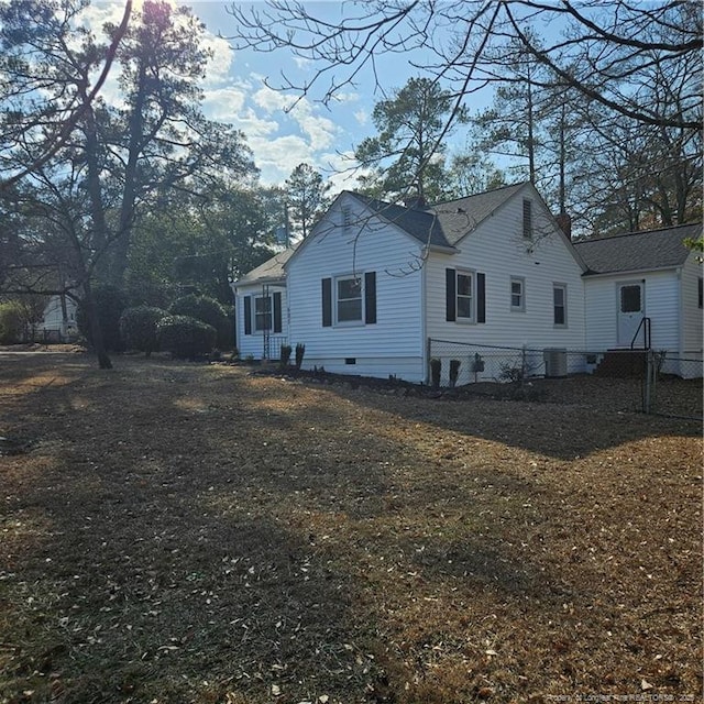 view of side of property featuring cooling unit